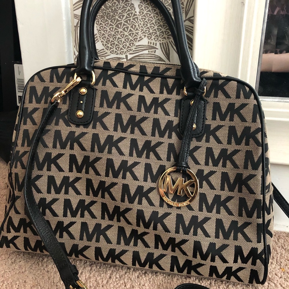 Michael Kors monogrammed crossbody/handle purse
